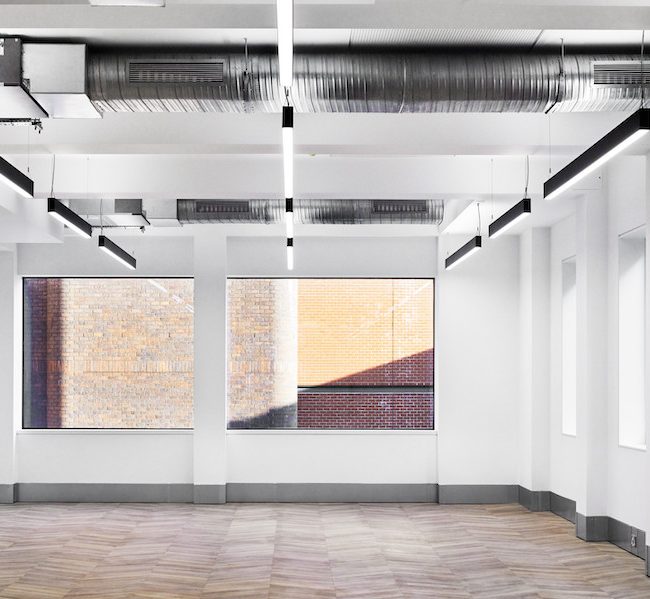 15 stukely street empty room with large windows