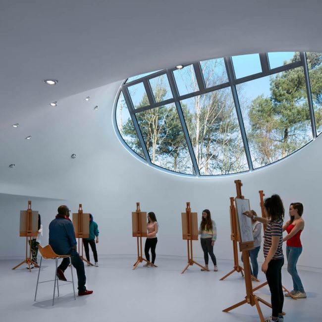 AUB Drawing studio custom oval window with students taking a drawing class